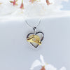 Child Holding Mom Hands Heart Pendant Necklace.